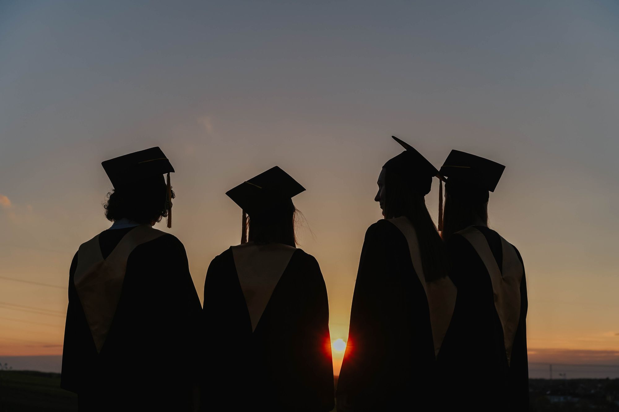 Where do graduates from Wales study and work?